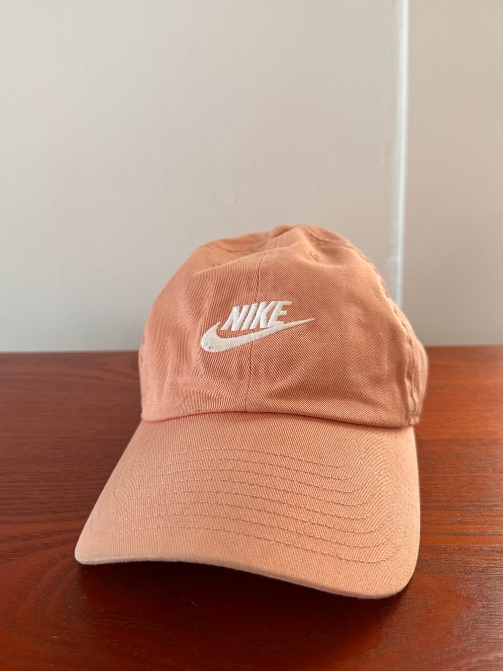 Nike Heritage86 Cap in Dusty Peach with Neon Swoosh Label